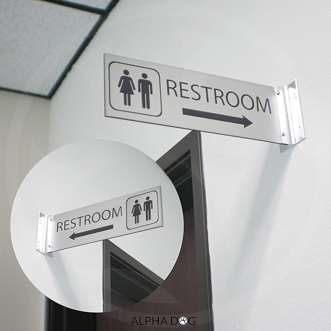 ALPHA DOG SIGNS Corridor Projecting Hallway Bathroom Sign, Left Arrow, 4"x12" Double Sided, Indoor/Outdoor, Easy Install, Durable Business Wayfinding Plaque, USA-Made (Brushed Stainless)